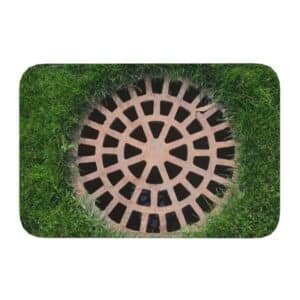 Tapis sol égout